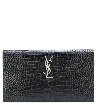 Saint Laurent Uptown embossed leather clutch | Thumbnail 1 Saint Laurent Uptown embossed leather clutch | Thumbnail 1