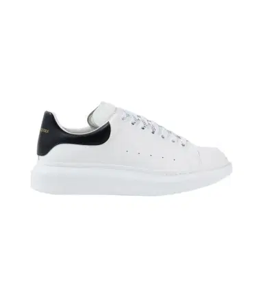 Alexander McQueen Oversized leather sneakers | Thumbnail 1 Alexander McQueen Oversized leather sneakers | Thumbnail 1