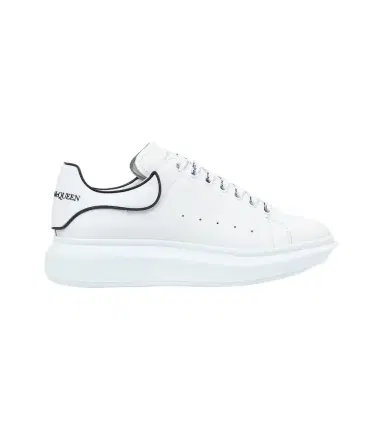 Alexander McQueen Oversized leather sneakers | Thumbnail 1 Alexander McQueen Oversized leather sneakers | Thumbnail 1