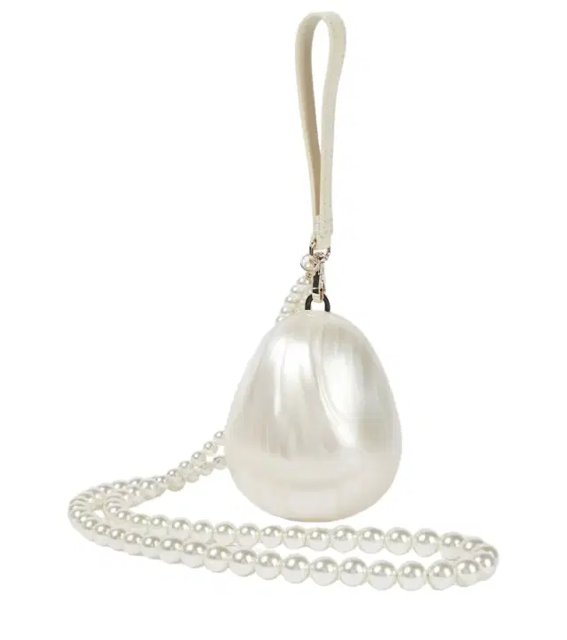Egg embellished clutch