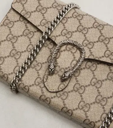Gucci Dionysus GG Supreme clutch | Thumbnail 6 Gucci Dionysus GG Supreme clutch | Thumbnail 6