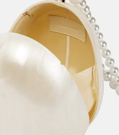 Simone Rocha Egg leather-trimmed clutch | Thumbnail 2 Simone Rocha Egg leather-trimmed clutch | Thumbnail 2