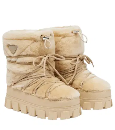 Prada Shearling and leather snow boots | Thumbnail 1