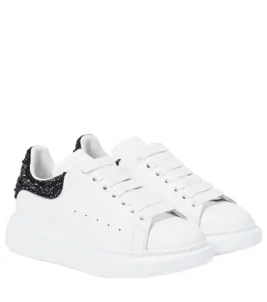 Alexander McQueen Oversized embellished leather sneakers | Thumbnail 1 Alexander McQueen Oversized embellished leather sneakers | Thumbnail 1