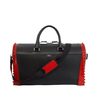 Christian Louboutin Sneakender spiked leather duffel bag | Thumbnail 1 Christian Louboutin Sneakender spiked leather duffel bag | Thumbnail 1