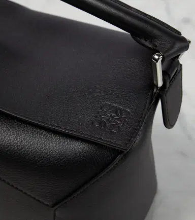 Loewe Puzzle Edge Small leather top-handle bag | Thumbnail 2 Loewe Puzzle Edge Small leather top-handle bag | Thumbnail 2