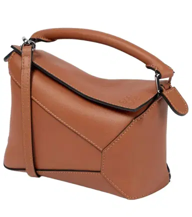 Loewe Puzzle Edge Mini leather top-handle bag | Thumbnail 1 Loewe Puzzle Edge Mini leather top-handle bag | Thumbnail 1