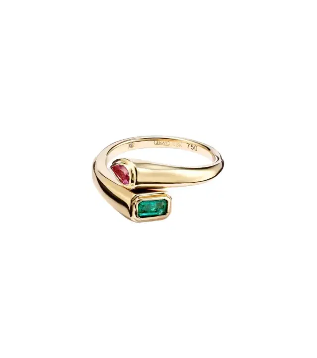 Bypass 18kt gold ring with emerald and sapphire