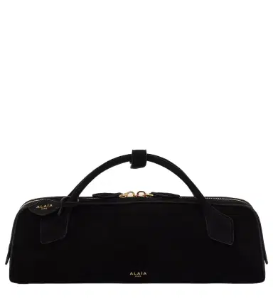 Alaia Alaïa Le Teckel suede clutch | Thumbnail 1 Alaia Alaïa Le Teckel suede clutch | Thumbnail 1