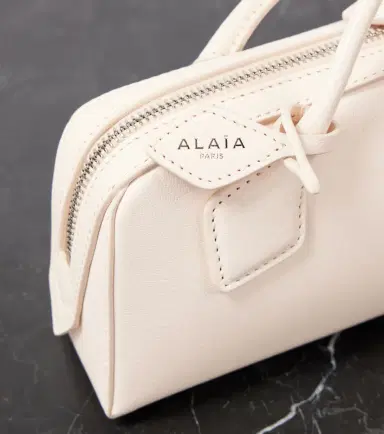 Alaïa Alaïa Le Teckel leather clutch | Thumbnail 3 Alaïa Alaïa Le Teckel leather clutch | Thumbnail 3