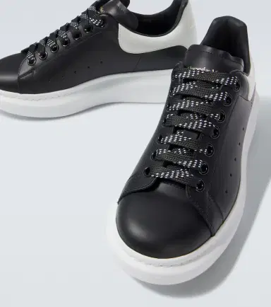 Alexander McQueen Oversized leather sneakers | Thumbnail 2 Alexander McQueen Oversized leather sneakers | Thumbnail 2