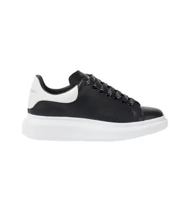 Alexander McQueen Oversized leather sneakers | Thumbnail 1 Alexander McQueen Oversized leather sneakers | Thumbnail 1