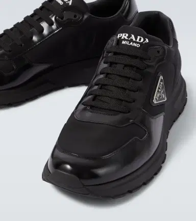 Prada Re-Nylon and leather sneakers | Thumbnail 2 Prada Re-Nylon and leather sneakers | Thumbnail 2