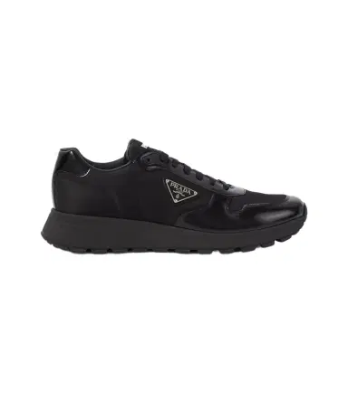 Prada Re-Nylon and leather sneakers | Thumbnail 1 Prada Re-Nylon and leather sneakers | Thumbnail 1