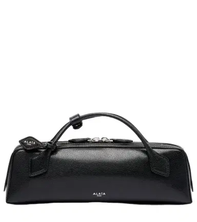 Alaia Alaïa Le Teckel Small leather clutch | Thumbnail 1 Alaia Alaïa Le Teckel Small leather clutch | Thumbnail 1