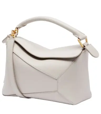 Loewe Puzzle Edge Small leather top-handle bag | Thumbnail 1 Loewe Puzzle Edge Small leather top-handle bag | Thumbnail 1