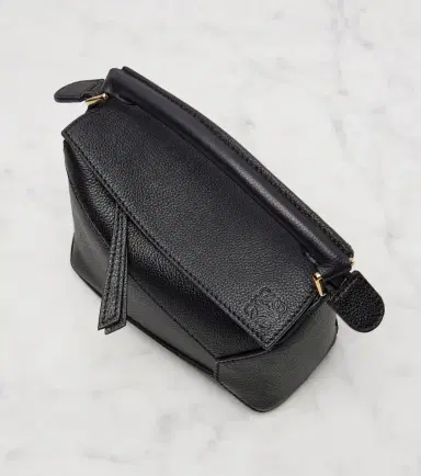 Loewe Puzzle Edge Mini leather top-handle bag | Thumbnail 3 Loewe Puzzle Edge Mini leather top-handle bag | Thumbnail 3