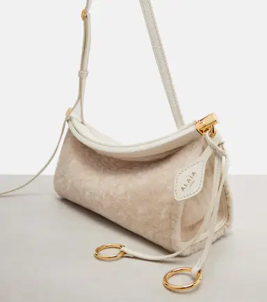 Alaïa Alaïa Le Click East West Small shearling shoulder bag | Thumbnail 3 Alaïa Alaïa Le Click East West Small shearling shoulder bag | Thumbnail 3