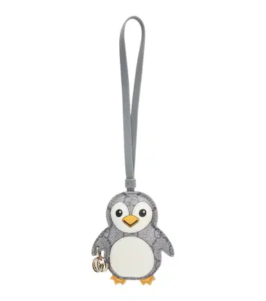 Gucci Penguin GG bag charm | Thumbnail 1 Gucci Penguin GG bag charm | Thumbnail 1