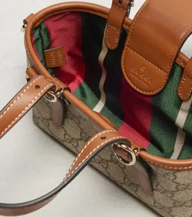 Gucci GG Canvas leather-trimmed top-handle bag | Thumbnail 2 Gucci GG Canvas leather-trimmed top-handle bag | Thumbnail 2
