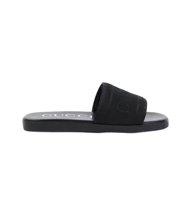 Gucci Logo canvas and leather slides
