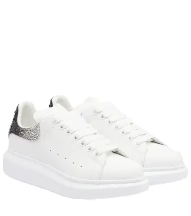 Alexander McQueen Oversized embellished leather sneakers | Thumbnail 1 Alexander McQueen Oversized embellished leather sneakers | Thumbnail 1