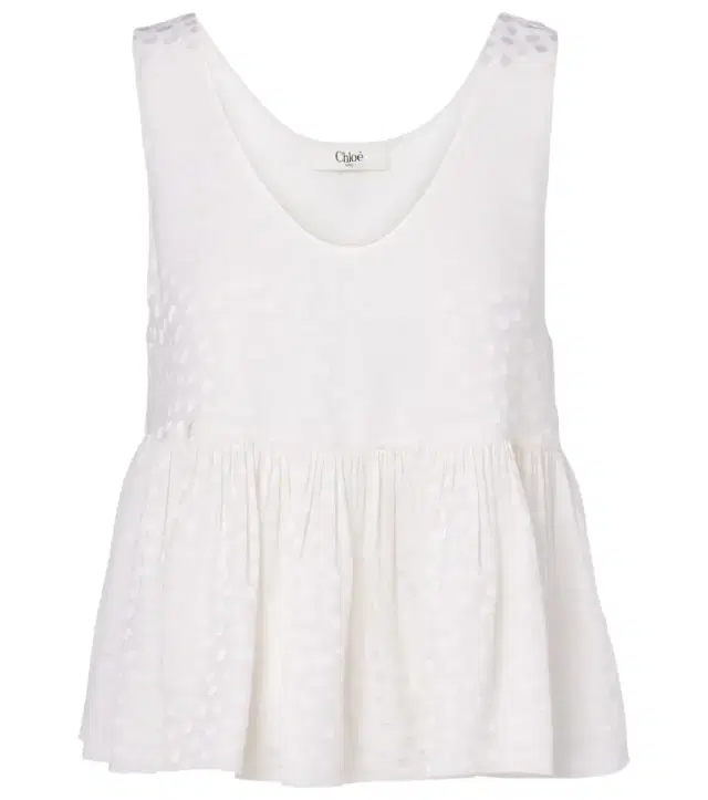 Chloé Polka-dot peplum silk top