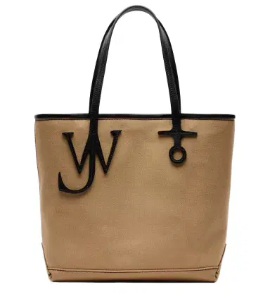 JW Anderson Leather-trimmed canvas tote bag | Thumbnail 1 JW Anderson Leather-trimmed canvas tote bag | Thumbnail 1