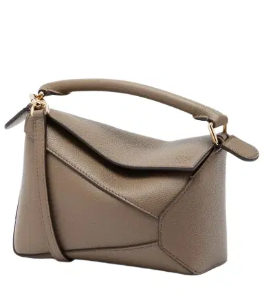Loewe Puzzle Edge Mini leather top-handle bag | Thumbnail 1 Loewe Puzzle Edge Mini leather top-handle bag | Thumbnail 1