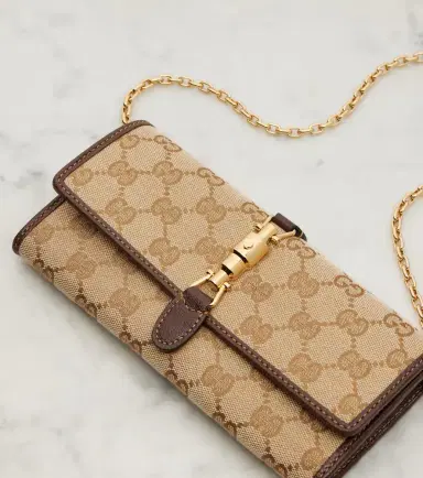 Gucci Jackie GG Canvas clutch | Thumbnail 3 Gucci Jackie GG Canvas clutch | Thumbnail 3