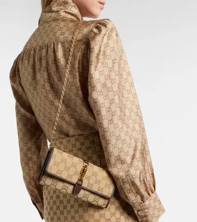 Gucci Jackie GG Canvas clutch | Thumbnail 5 Gucci Jackie GG Canvas clutch | Thumbnail 5