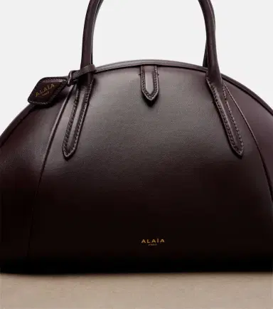 Alaïa Alaïa Purse Small leather top-handle bag | Thumbnail 4 Alaïa Alaïa Purse Small leather top-handle bag | Thumbnail 4