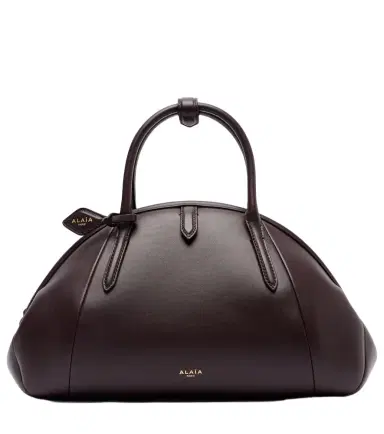 Alaïa Alaïa Purse Small leather top-handle bag | Thumbnail 1 Alaïa Alaïa Purse Small leather top-handle bag | Thumbnail 1
