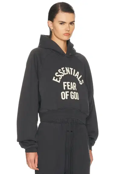 Fear of God Essentials Campus 90's Cropped Raglan Fleece Hoodie | Thumbnail 2 Fear of God Essentials Campus 90's Cropped Raglan Fleece Hoodie | Thumbnail 2
