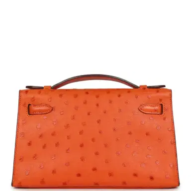 HERMÈS Pre-owned Hermes Kelly Pochette Tangerine Ostrich Gold Hardware | Thumbnail 4 HERMÈS Pre-owned Hermes Kelly Pochette Tangerine Ostrich Gold Hardware | Thumbnail 4