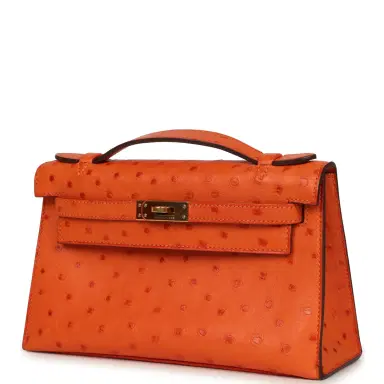 HERMÈS Pre-owned Hermes Kelly Pochette Tangerine Ostrich Gold Hardware | Thumbnail 5 HERMÈS Pre-owned Hermes Kelly Pochette Tangerine Ostrich Gold Hardware | Thumbnail 5