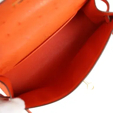 HERMÈS Pre-owned Hermes Kelly Pochette Tangerine Ostrich Gold Hardware | Thumbnail 7 HERMÈS Pre-owned Hermes Kelly Pochette Tangerine Ostrich Gold Hardware | Thumbnail 7