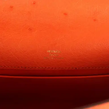 HERMÈS Pre-owned Hermes Kelly Pochette Tangerine Ostrich Gold Hardware | Thumbnail 8 HERMÈS Pre-owned Hermes Kelly Pochette Tangerine Ostrich Gold Hardware | Thumbnail 8