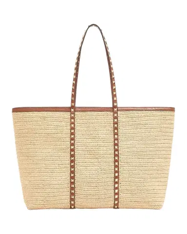 Valentino Garavani Rockstud Raffia Leather-Trim Tote Bag | Thumbnail 1 Valentino Garavani Rockstud Raffia Leather-Trim Tote Bag | Thumbnail 1