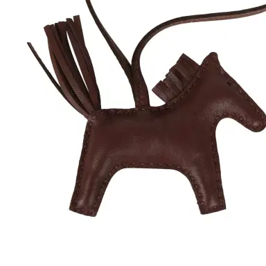 HERMÈS Hermes Rodeo Rock Bag Charm PM Terre Milo Lambskin Gold Hardware | Thumbnail 5 HERMÈS Hermes Rodeo Rock Bag Charm PM Terre Milo Lambskin Gold Hardware | Thumbnail 5