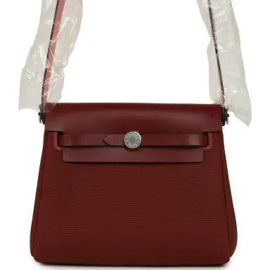 HERMÈS Hermes Herbag Zip 20 Mini Rouge H Toile Militaire Canvas and Vache Hunter Palladium Hardware | Thumbnail 1 HERMÈS Hermes Herbag Zip 20 Mini Rouge H Toile Militaire Canvas and Vache Hunter Palladium Hardware | Thumbnail 1