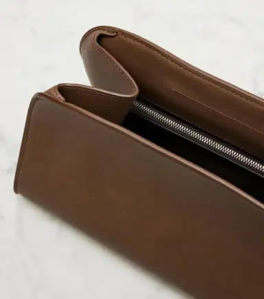 The Row Peggy Small leather clutch | Thumbnail 2 The Row Peggy Small leather clutch | Thumbnail 2