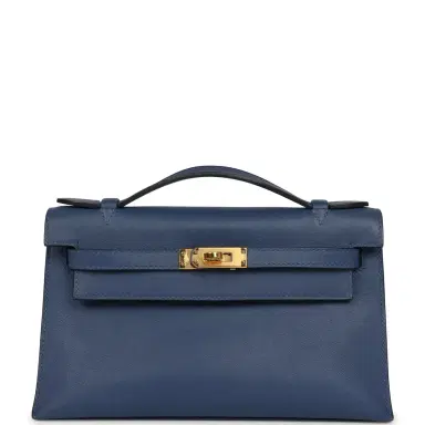 HERMÈS Pre-owned Hermes Kelly Pochette Bleu Brighton Swift Gold Hardware | Thumbnail 1 HERMÈS Pre-owned Hermes Kelly Pochette Bleu Brighton Swift Gold Hardware | Thumbnail 1