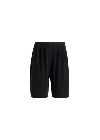 Khaite Poppy Short In Black | Thumbnail 1