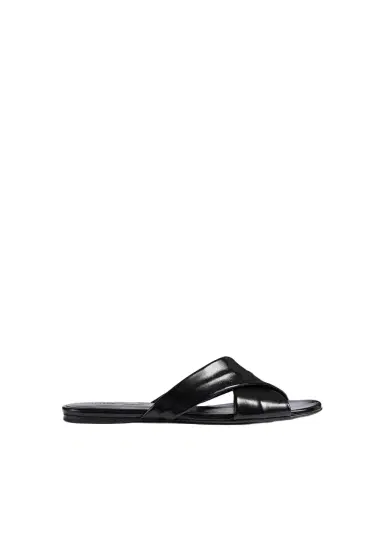 Khaite Liria Flat Sandal In Black Glazed Leather | Thumbnail 1 Khaite Liria Flat Sandal In Black Glazed Leather | Thumbnail 1