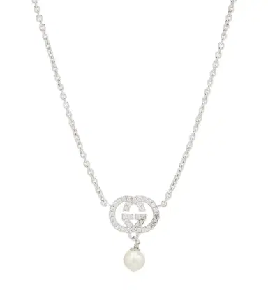 Gucci Interlocking G embellished pendant necklace | Thumbnail 1 Gucci Interlocking G embellished pendant necklace | Thumbnail 1
