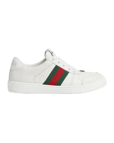 Gucci GG Embossed Leather Low-Top Sneakers | Thumbnail 1