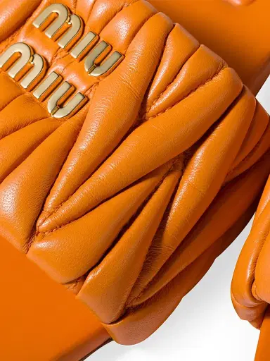 Miu Miu Women's Matelasse Nappa Leather Slides - Orange | Thumbnail 3 Miu Miu Women's Matelasse Nappa Leather Slides - Orange | Thumbnail 3