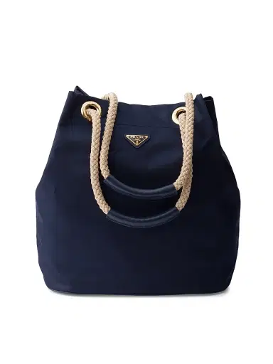 Prada Women's Mariner Large Re-Nylon Bucket Bag - Blue | Thumbnail 1 Prada Women's Mariner Large Re-Nylon Bucket Bag - Blue | Thumbnail 1