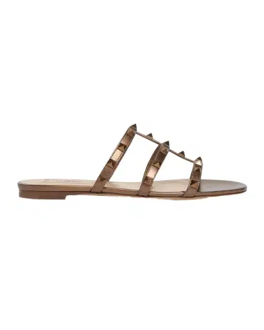 Valentino Garavani Rockstud Metallic City Flat Slide Sandals | Thumbnail 1 Valentino Garavani Rockstud Metallic City Flat Slide Sandals | Thumbnail 1